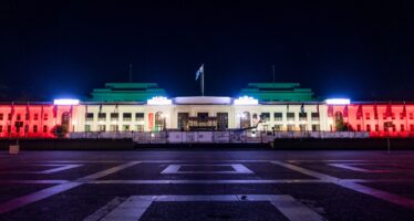 Iconic structures illuminated in Red and Green in Canberra