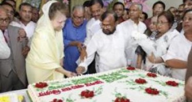 Khaleda, 67, cuts as many pounds cake